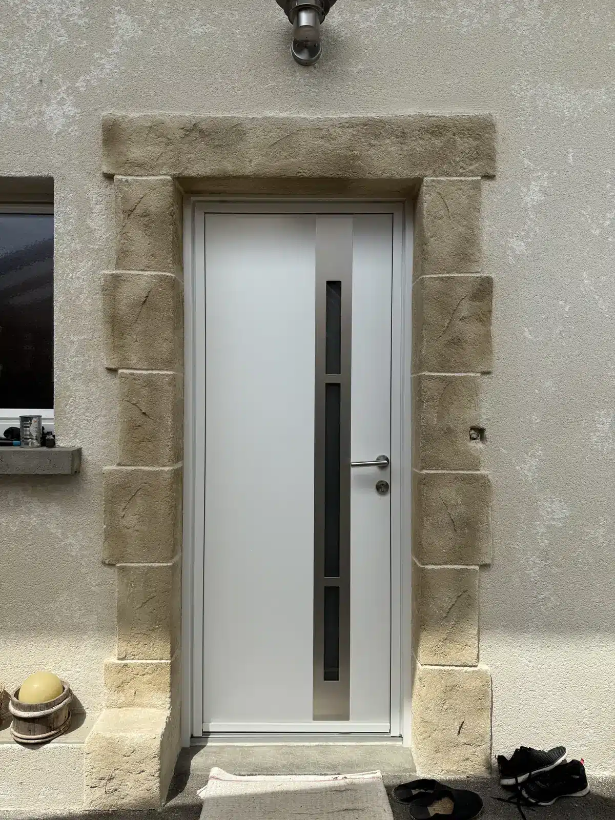 Encadrement de porte d'entrée en effet pierre